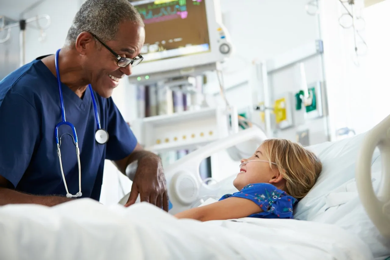 Doctor and little girl talking